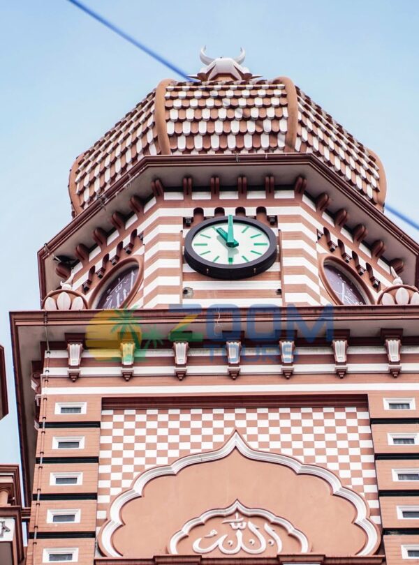 The red-and-white Jami Ul-Alfar Mosque in Pettah, featured on our Colombo cultural tuk tuk tour.