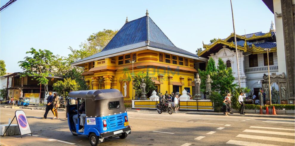 A tuk tuk parked near Colombo’s Gangaramaya Temple