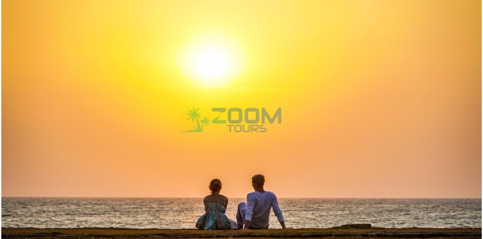 Couple at Galle Face Green enjoying the sunset during Colombo City Romantic Tour.